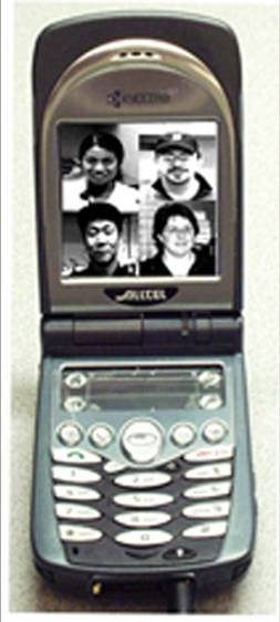 Flip phone programmed to call 4 numbers, activated by touching a picture on the screen. On the screen are 4 headshots of individuals.